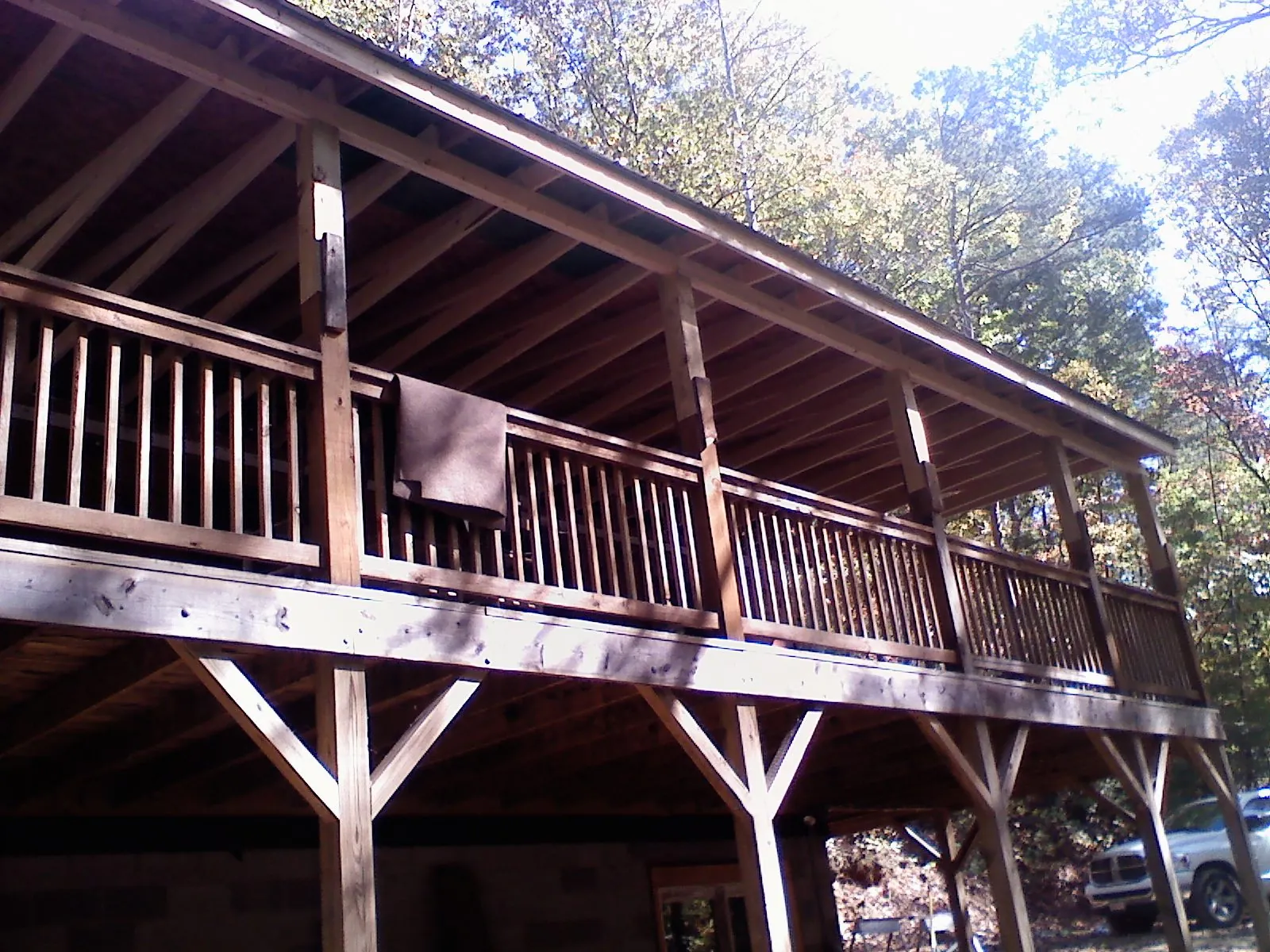 Timber framing under a new elevated porch and deck — Roof Leak Repair in West Bridgewater by Roofing Brothers